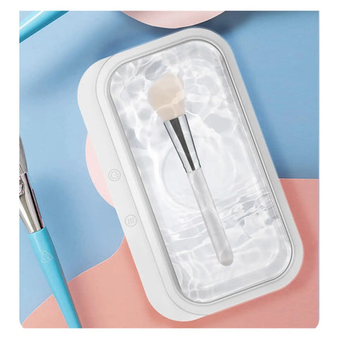 15W Ultrasonic Cleaner Machine With 400Ml Tank, displaying a makeup brush in water for cleaning, with a white casing.