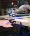 Person attaching Two Track Clamps With Non Slip Grip For Track Saws to a wooden piece for T Slot Tracks, Model KMA7520.