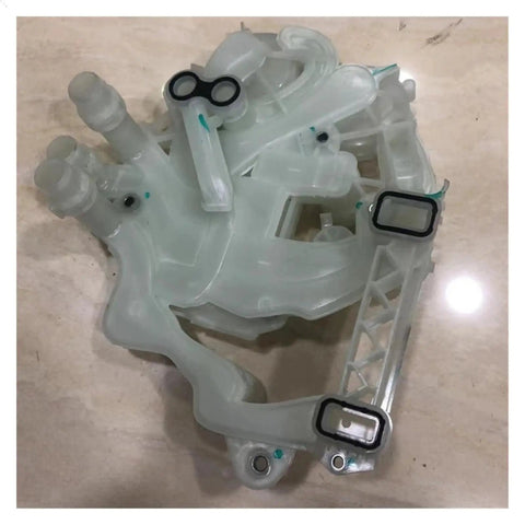 Heavy Duty Cooling Water Pump And Heat Pump Lines For Tesla Model 3 and Y, clear polyamide housing, designed for coolant management.