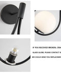 Modern Globe Wall Sconce Set Of 2 Black Glass Drop Lights details with frosted globe and bulb holders