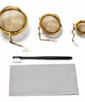 Slick All In One Jewelry Cleaning Kit Featuring Three Stainless Steel Ultrasonic Baskets, an ultra soft detailing brush, and polishing cloth.