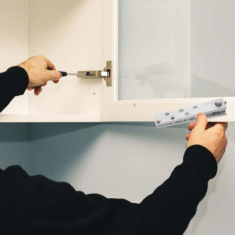 Installing Hidden Door Hinge 360 Degree Stainless Steel Rotating Pivot on a cabinet for concealed hardware setup.