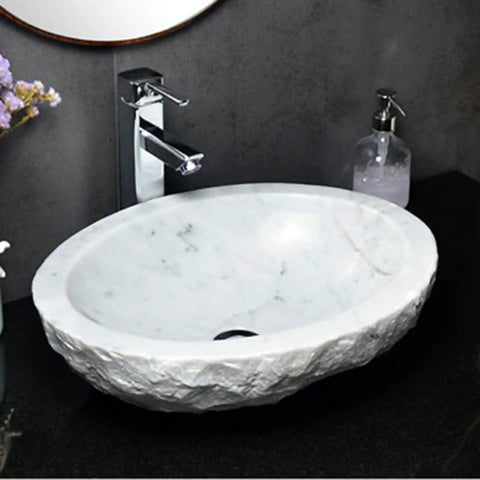 Durable Modern Oval Marble Vessel Sink Handcrafted From Real Natural Stone Above Counter Bathroom Vanity Bowl on black countertop.