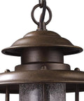 Close-up of the top of Wikshire 8 Inch Wide 1 Light Outdoor Pendant in Coffee Bronze with cast aluminum and clear crackle glass.