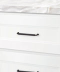 Hollywood Hills 4486 Cabinet Pull 6 Inch Center To Center Solid Brass Hardware installed on a white kitchen drawer.