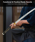 Unsharpened Aluminum Wakizashi Iaito For Iaido Practice And Display, Lightweight 1.6 Lb Blade being held by practitioner