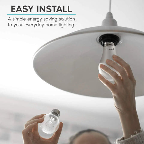 Person installing Lit A19 LED Light Bulbs 100 Watt Equivalent Dimmable 5000K Bright White 1600 Lumens in ceiling fixture