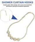 Close-up of a single gold tone shower curtain hook with bead rollers, part of the 15 Pcs Metal Shower Curtain Rings With Beads Decor Glide Rollers For Smooth Hanging On Shower Rod Gold Tone Iron Hooks For Home Bath Accessories Durable Snag Free Easy Glide set.