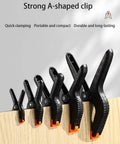 Grab This Heavy Duty Plastic Spring Clamps 20 Pack For Woodworking, Balloon Arch Backdrop And Tarps With Multi Size Durability Hand Tools That Are Totally Sick. Black A-shaped plastic spring clamps in multiple sizes on wood