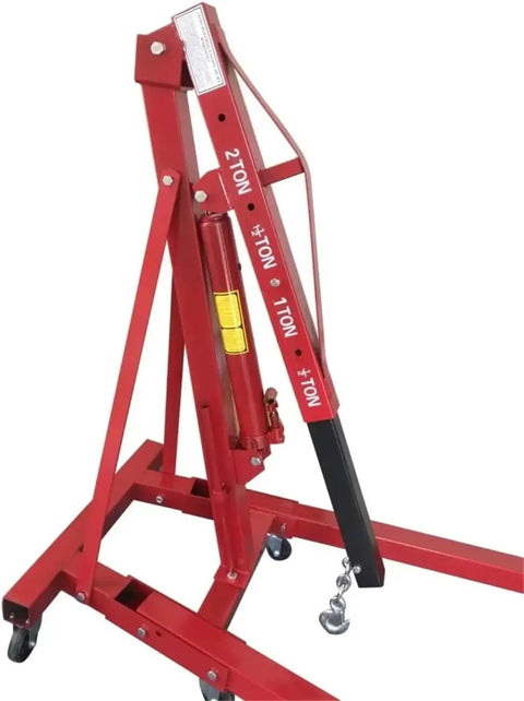 Top Shelf Folding Hydraulic Engine Hoist With Telescopic Boom 2 Ton Capacity Muscle Power Motor Crane For Tough Garage Builds. Close-up of hoist frame.