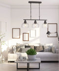 Three Light Farmhouse Kitchen Island Pendant Chandelier, 35.4 in Long, Black Finish With Seeded Bubble Glass in modern living room