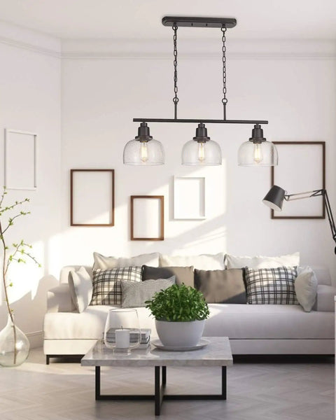 Three Light Farmhouse Kitchen Island Pendant Chandelier, 35.4 in Long, Black Finish With Seeded Bubble Glass in modern living room