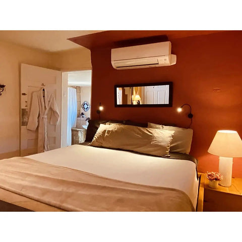 Bedroom with plug in LED reading lamp wall sconce 3W warm white 3000K bead lens soft light flexible gooseneck black finish