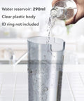 Person pouring water into XL Portable Bidet Water Chamber Extension Tank 290mL Capacity for Travel Bidet Sprayer Increases Water Volume.