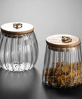 Score A Solid Straight Up Airtight Glass Tea Canister And Coffee Bean Storage Jar With Moisture Proof Seal To Keep Every Cup Fresh Built With Thick Clear Glass Perfect For Home Use Today, featuring thick clear glass and ribbed design.