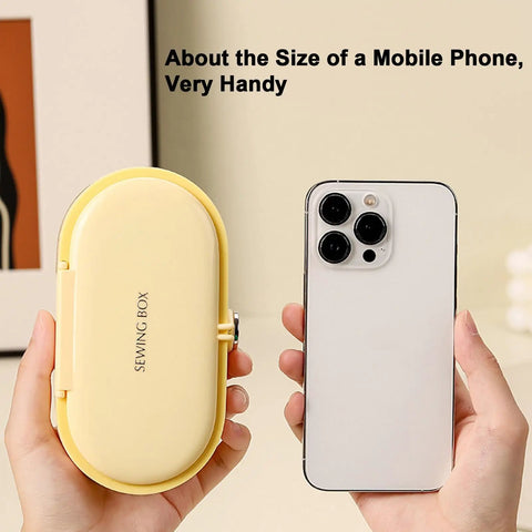 Grab And Go Travel Sewing Kit With Round Case Emergency Repair Gear in yellow next to a mobile phone for size comparison.