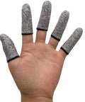 Hand wearing 12 Piece Finger Cots Set Cut Resistant Protectors, non-slip HPPE fabric finger covers for kitchen, cooking, work, grey color