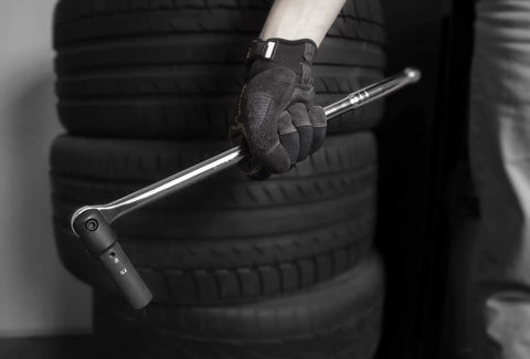 Extended 18 Inch Three Eighths Inch Drive Breaker Bar With Heavy Duty Chrome Vanadium Shaft And Chrome Molybdenum Head shown in use