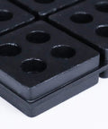 Close-up of Heavy Duty 4 By 4 Inch Three Quarters Inch Thick Waffle Vibration Isolation Pads Set Of Four for HVAC systems and machinery