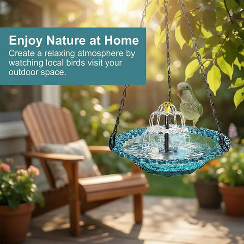 Sun Powered Hanging Bird Bath Fountain With Glass Bowl Cascade Solar Pump No Wiring Outdoor Water Feature For Garden Patio Or Yard In Blue That Attracts Backyard Birds And Runs Automatically In Sunshine Super Easy Setup on a tree branch with a bird, outdoor setting.