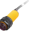 Close-up of Infrared Photoelectric Switch Obstacle Avoidance Sensor Module E18D80NK with yellow housing and cable