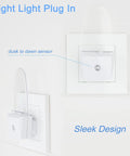 4 Pack Plug In Blue LED Night Lights with Dusk to Dawn Sensor mounted showing sleek design and sensor detail