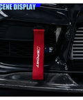 Custom Red Deco Tow Strap For Car Bumper And Trunk, Stylish Trailer Belt plus Towing Rope auto exterior bling displayed on vehicle.