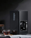 Next Level Bean To Cup Coffee Machine With Automatic Espresso Brewing and Capsule Compatibility on kitchen counter with coffee cup.