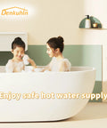 Front view of a white freestanding bathtub with two people in a bubble bath; Denkuhin logo on the wall.
