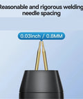 Close-up of welding needle spacing on portable handheld spot welder for DIY projects, adjustable 11 power levels, compact welding machine.