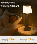 Black finish Cordless Rechargeable Table Lamp With USB Charging, Touch Dimmer, shown lit on bedside table in bedroom.