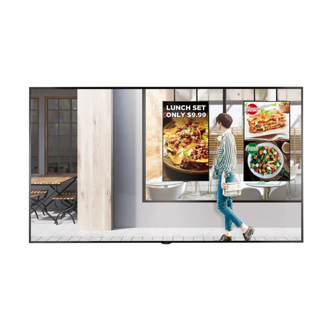 Forty Nine Inch Digital Signage Display Rock Solid Fanless WebOS Smart Panel 2500 Nit Brightness glare-free display showcasing food menus in storefront.