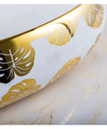 Bathroom Sink Hotel Bathroom Wash Basin Oval Above Table Basin Gold Leaf Flower Art Basin detail on curved edge with gold leaf design.