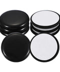Self Adhesive Furniture Sliders 8 Pack Round Floor Savers That Slide Like Hot Butter No Nonsense Moving Pads Reusable Chair And Table Glide Protectors Heavy Duty Black PE Plastic round pads with black exterior on a white background.