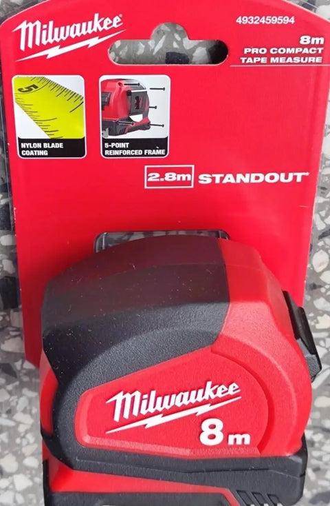 Pro Compact 8m Metric Tape Measure With Locking Blade And Quick Readout in packaging, red steel case, DIY tool.