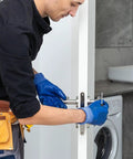 Person using 50 Pieces M4x25 Black Aluminum Round Head Blind Rivets with Large Flange for DIY door repair project