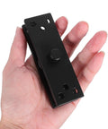Hand holding black heavy duty stainless steel hidden door hinge with 360 degree pivot, showcasing its compact design for doors.