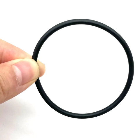Engine Camshaft Adjuster Magnet Seal 52X3 mm WHT007212B shown held between fingers