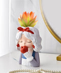 Girl Flower Pot Mold Silicone Planter And Candle Holder For Concrete And Epoxy Resin Craft shown as a decorative vase