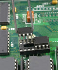 Two Row DIP IC Socket Adaptor 24 Pin Soldering Type in use on a circuit board, 2.54mm pitch, 7.62mm row spacing, flat pins.