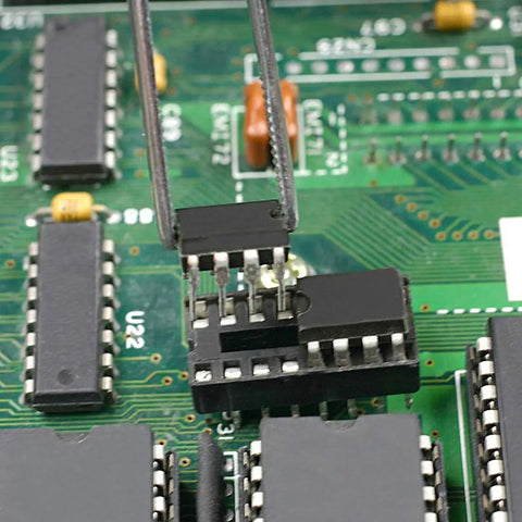 DIP IC Socket Adapter Set, 2.54mm Pitch, Dual Row 15.2mm, 40 Round Pins being placed on a PCB with tweezers