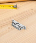 Upgrade Your Yacht With 4pc Stainless Steel Boat Door Catches Windproof Holders For Cabin Doors That Stop Noise And Slams Securely On Any Marine Vessel on wooden surface with measuring tape.