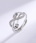Silver-tone knot fidget ring with bead spinning for stress relief and focus, featuring adjustable design and calming benefits.