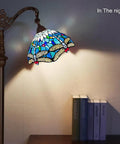 Dope Tiffany Style Stained Glass Floor Lamp with Sea Blue Dragonfly Pattern illuminating a room at night, 62 inch tall pole.