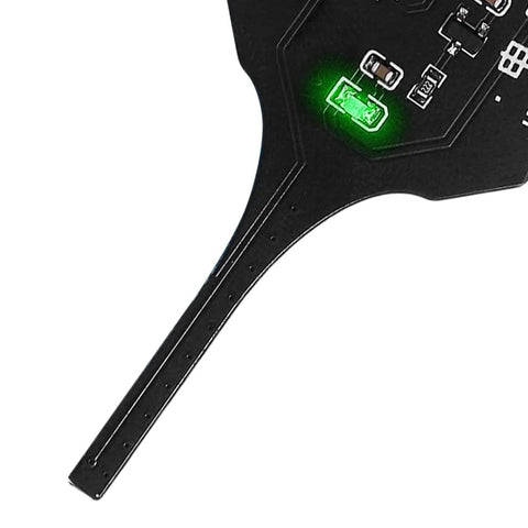 Close-up of Portable Inductor Tester For Circuit Boards Quick Fault Check Tool For Motherboards And PCBs Inductance Meter glowing light