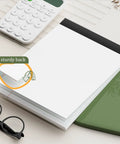 Stack of 12 Pack Legal Pads 8.5 By 11.75 College Ruled Notepads White Paper Perforated Writing Pads With 30 Sheets on desk