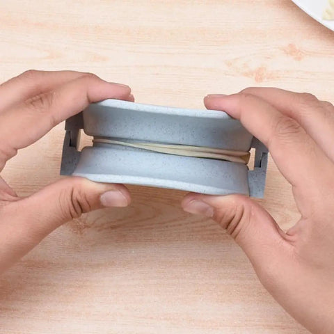 Hassle Free Wheat Straw Dumpling Press Three Sizes Foldable Kitchen Gadget For Quick Homemade Ravioli held in hands.