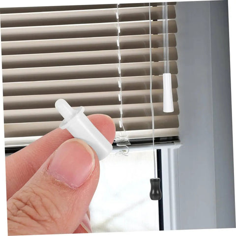80-Piece Spring Loaded Pins DIY Window Blind Repair Kit With Essential Shutter Hardware For Quick Self Fixes in hand near blinds