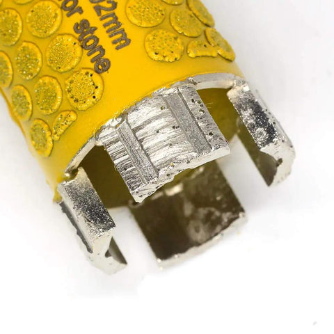 Close-up view of a 1 3/8 inch diamond core drill bit for stone and granite with dot protection, electroplated for dry or wet use.