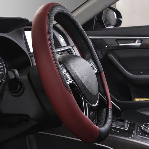 Rhombus Microfiber Leather Steering Wheel Cover Universal Fit For Car Suv Truck Van With Padded Sides And Slick Grip In Black And Burgundy, side view in car interior.